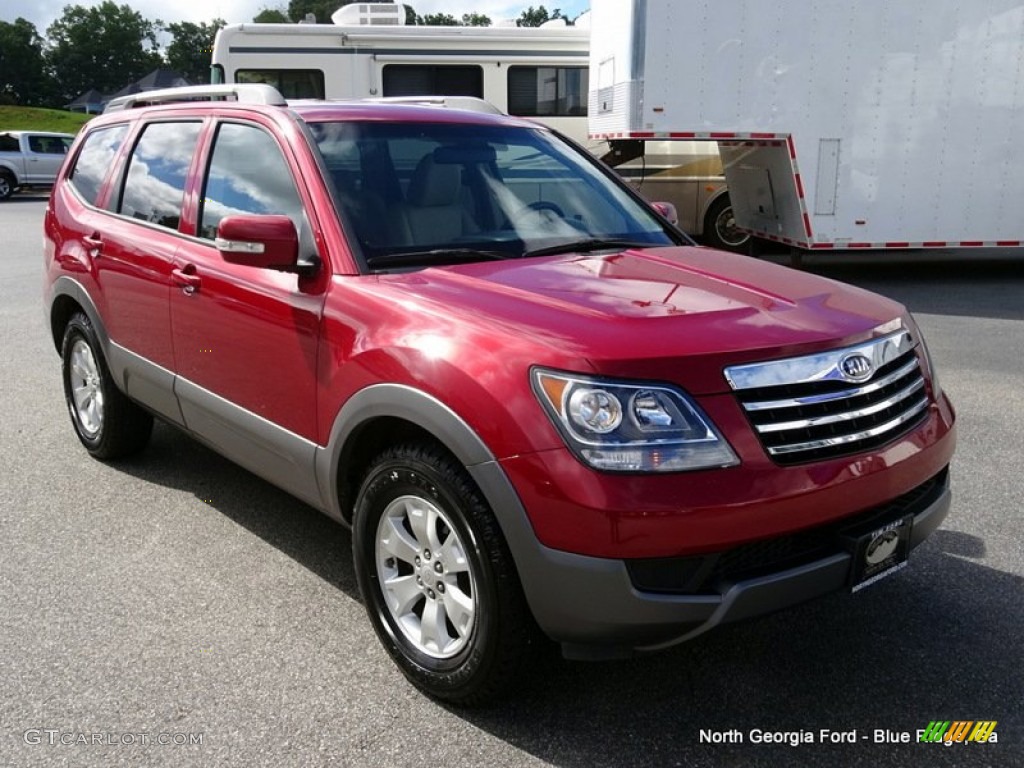 2009 Borrego LX V6 4x4 - Spicy Red / Beige photo #7