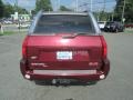 2004 Magnetic Red Metallic GMC Envoy XUV SLT 4x4  photo #7