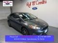 2015 Magnetic Metallic Ford Focus SE Sedan  photo #1