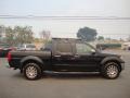 2011 Super Black Nissan Frontier SL Crew Cab 4x4  photo #8