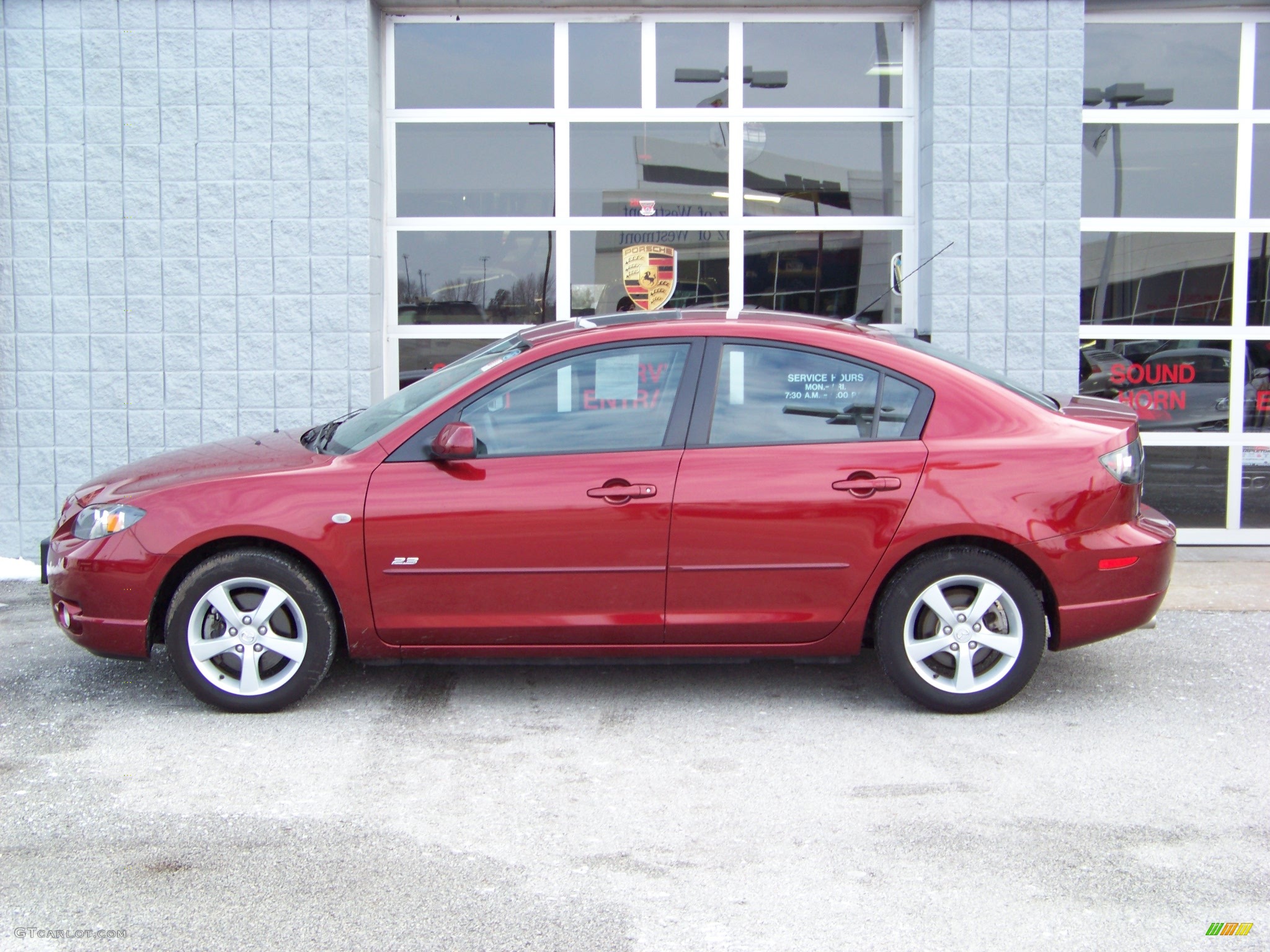 2006 MAZDA3 s Touring Sedan - Copper Red Mica / Black/Red photo #6