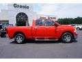 2014 Flame Red Ram 1500 SLT Quad Cab  photo #8