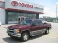 1998 Dark Carmine Red Metallic Chevrolet C/K K1500 Silverado Extended Cab 4x4  photo #1