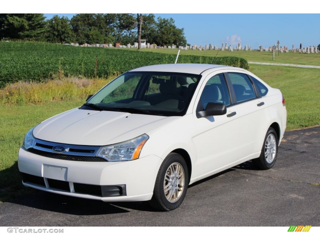 White Suede 2009 Ford Focus SE Sedan Exterior Photo #106286117
