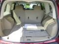 2016 Jeep Patriot Light Pebble Beige/Dark Slate Gray Interior Trunk Photo