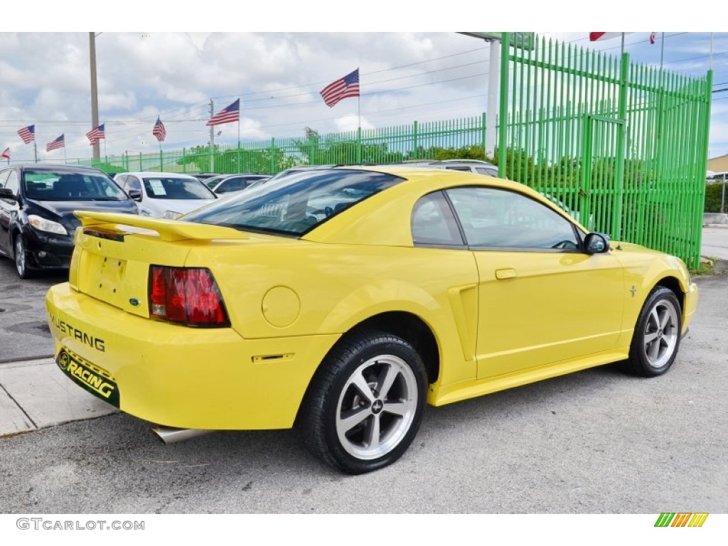 2002 Mustang V6 Coupe - Zinc Yellow / Medium Graphite photo #9