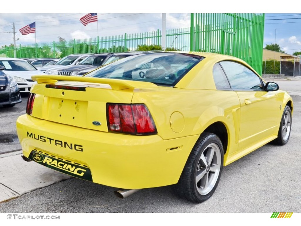 2002 Mustang V6 Coupe - Zinc Yellow / Medium Graphite photo #10
