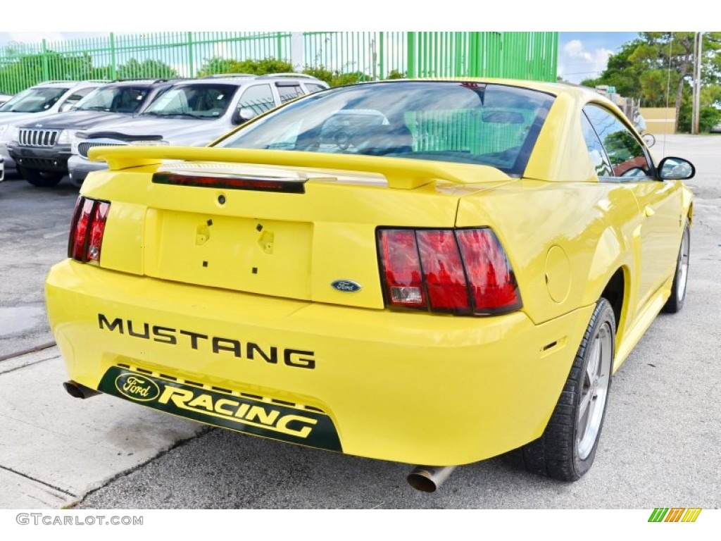 2002 Mustang V6 Coupe - Zinc Yellow / Medium Graphite photo #11