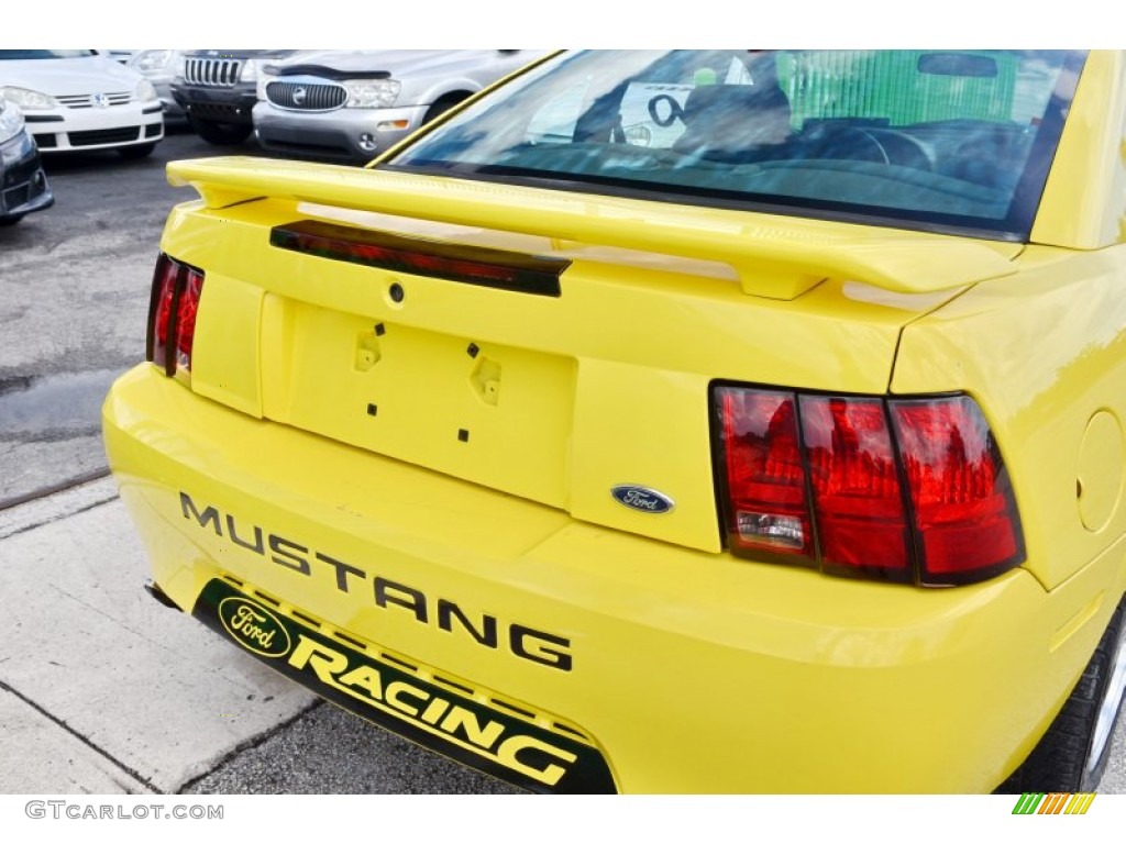 2002 Mustang V6 Coupe - Zinc Yellow / Medium Graphite photo #12