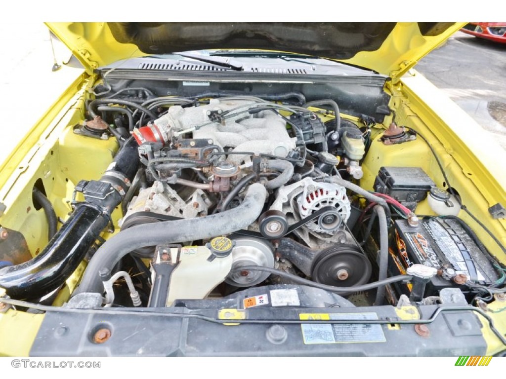 2002 Mustang V6 Coupe - Zinc Yellow / Medium Graphite photo #27