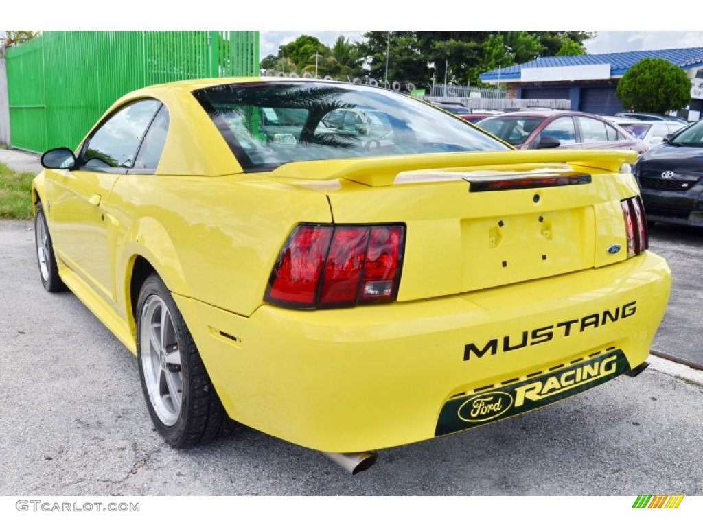 2002 Mustang V6 Coupe - Zinc Yellow / Medium Graphite photo #43