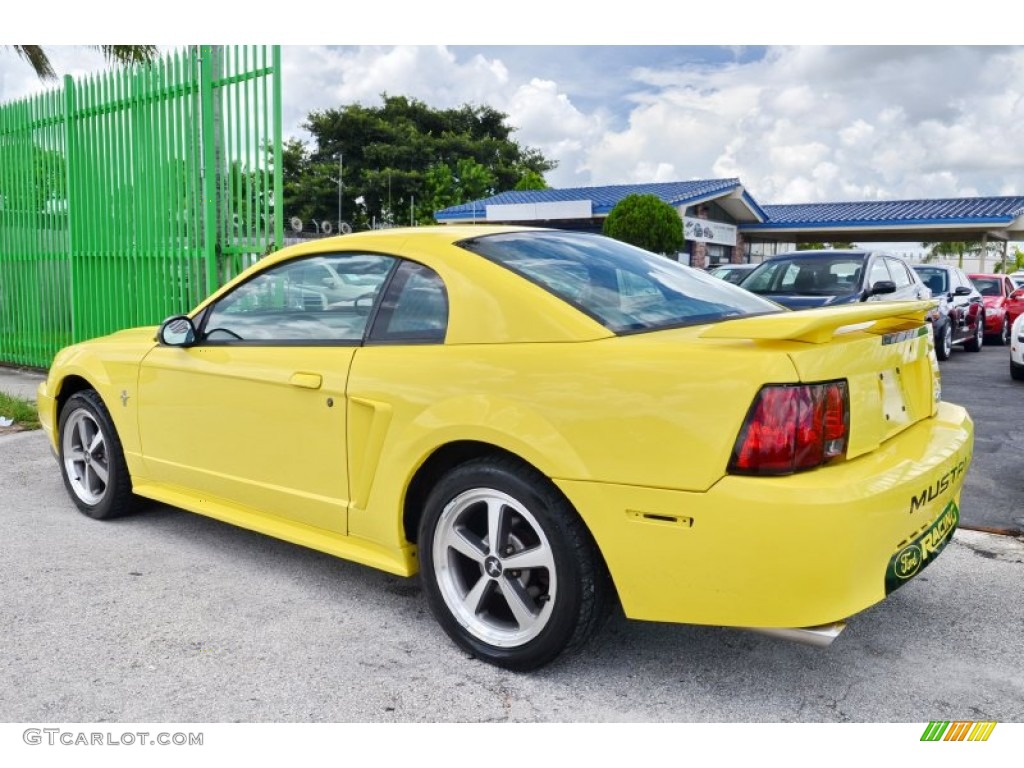 2002 Mustang V6 Coupe - Zinc Yellow / Medium Graphite photo #44