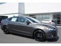 2016 Magnetic Metallic Ford Fusion SE  photo #1