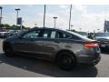 2016 Magnetic Metallic Ford Fusion SE  photo #25