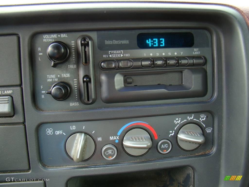 1995 Sierra 1500 SLE Extended Cab 4x4 - Bright Teal Metallic / Burgundy photo #16