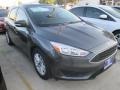 2015 Magnetic Metallic Ford Focus SE Sedan  photo #1