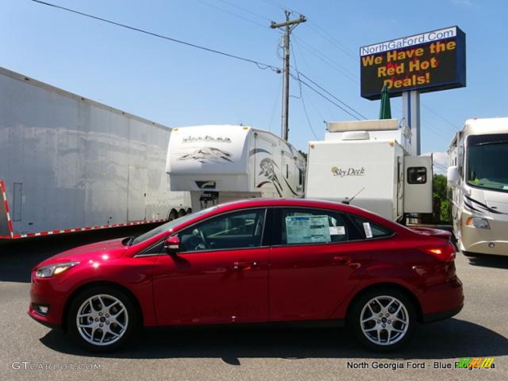 2015 Focus SE Sedan - Ruby Red Metallic / Charcoal Black photo #2