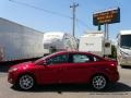 2015 Ruby Red Metallic Ford Focus SE Sedan  photo #2