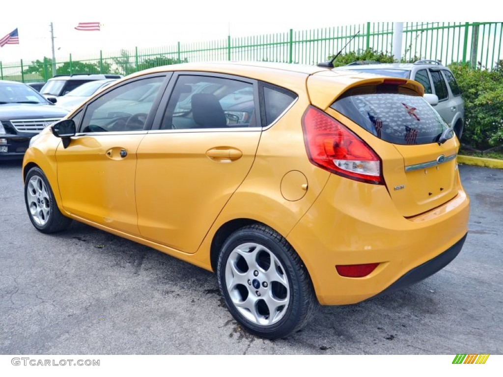 2011 Fiesta SES Hatchback - Yellow Blaze Metallic Tri-Coat / Plum/Charcoal Black Leather photo #6