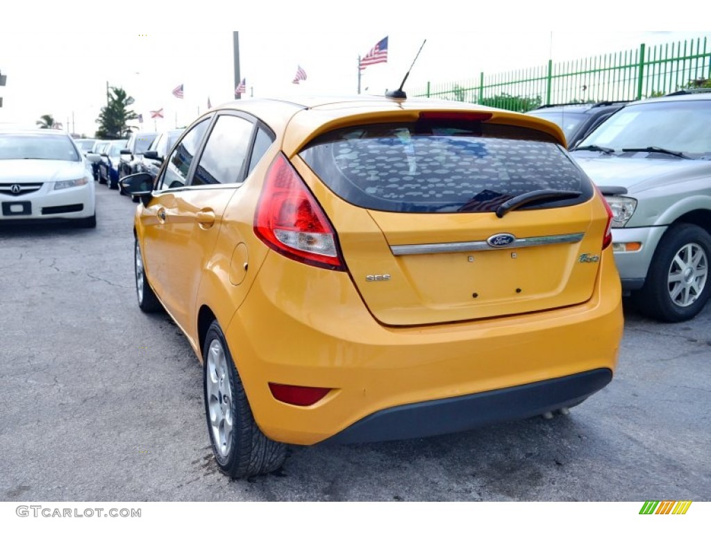 2011 Fiesta SES Hatchback - Yellow Blaze Metallic Tri-Coat / Plum/Charcoal Black Leather photo #7