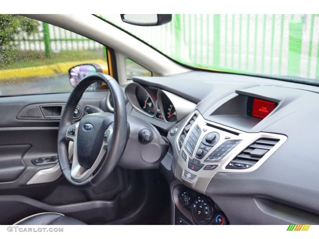 2011 Fiesta SES Hatchback - Yellow Blaze Metallic Tri-Coat / Plum/Charcoal Black Leather photo #34