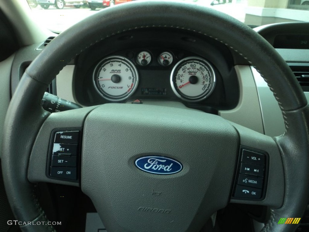 2009 Focus SE Coupe - Vista Blue Metallic / Medium Stone photo #11