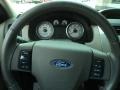 2009 Vista Blue Metallic Ford Focus SE Coupe  photo #11