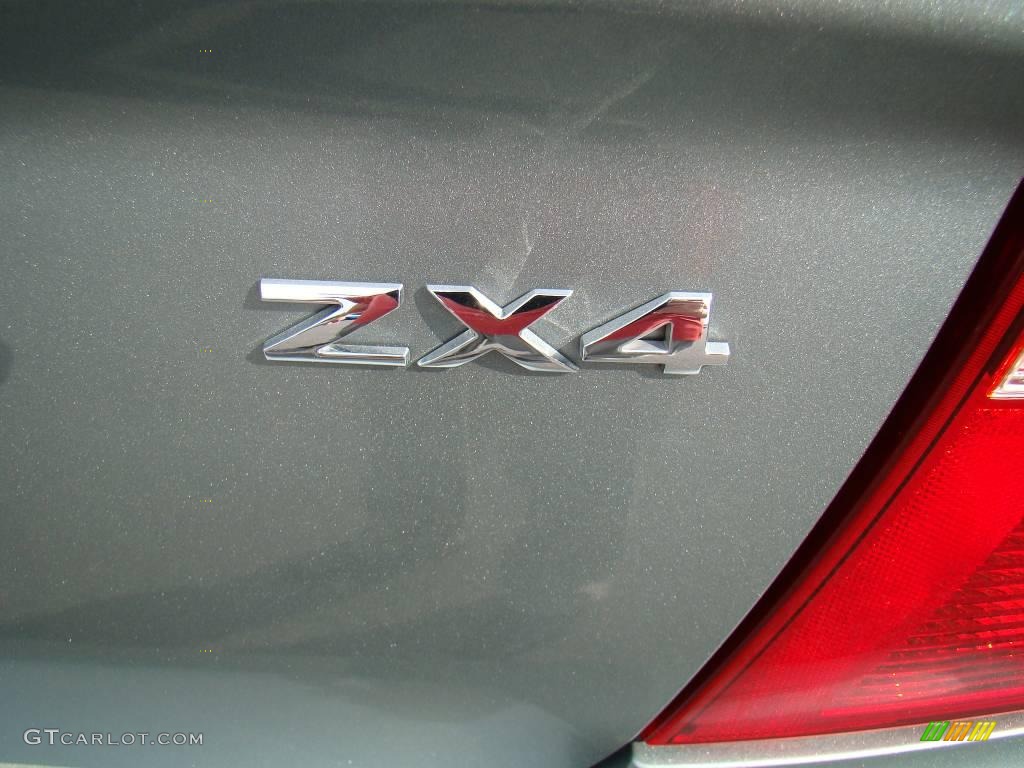 2005 Focus ZX4 SE Sedan - Light Tundra Metallic / Dark Pebble/Light Pebble photo #15