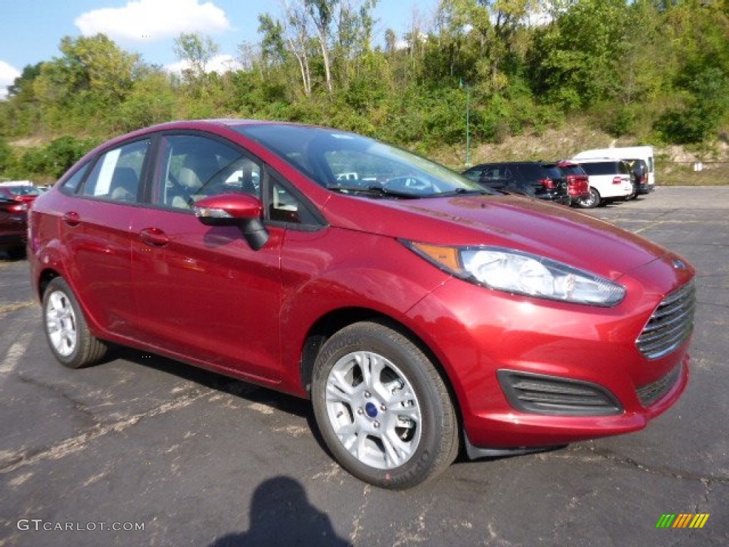 2016 Fiesta SE Sedan - Ruby Red Metallic / Medium Light Stone photo #1