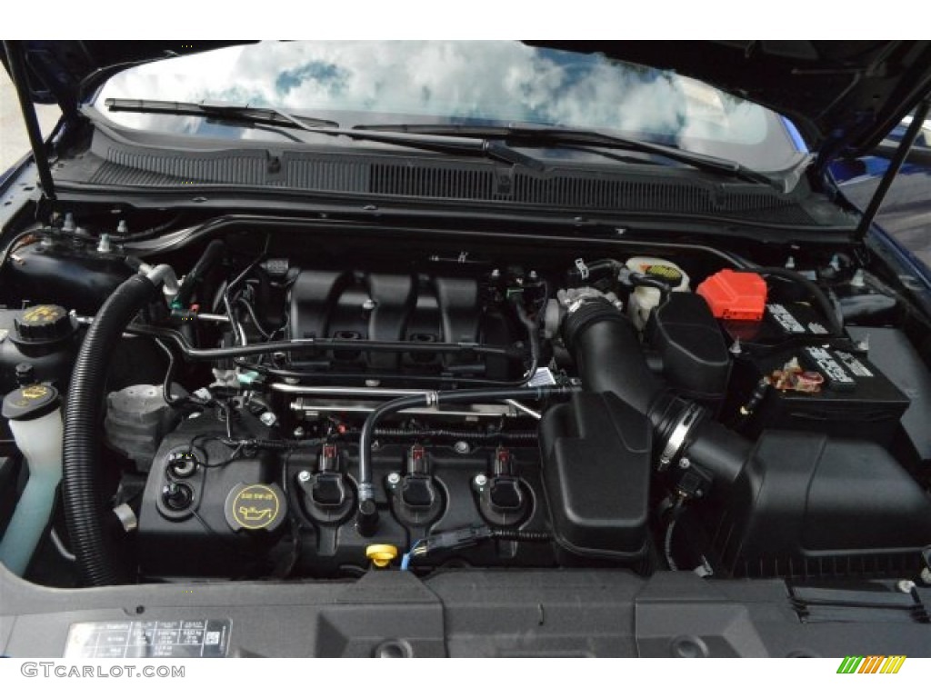 2015 Taurus Limited - Deep Impact Blue Metallic / Charcoal Black photo #26