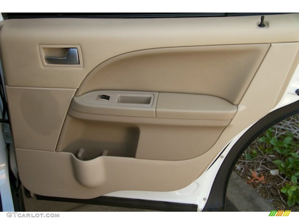 2005 Ford Freestyle SE AWD Pebble Door Panel Photo #107244083