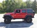 2010 Flame Red Jeep Wrangler Unlimited Rubicon 4x4  photo #11