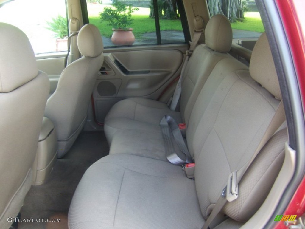 2002 Grand Cherokee Laredo - Inferno Red Tinted Pearlcoat / Sandstone photo #12