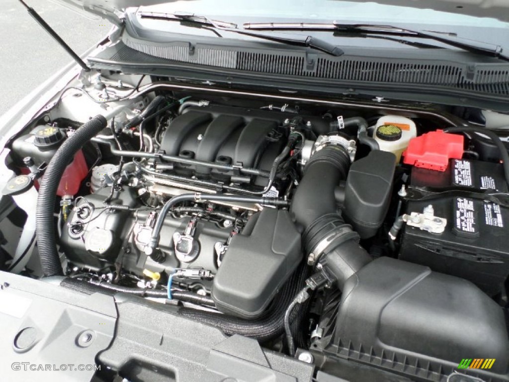 2015 Taurus SEL - Ingot Silver Metallic / Charcoal Black photo #12