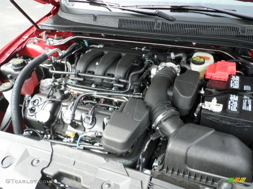 2015 Taurus Limited - Ruby Red Metallic / Charcoal Black photo #12
