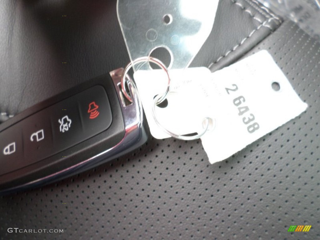 2015 Taurus Limited - Ruby Red Metallic / Charcoal Black photo #33