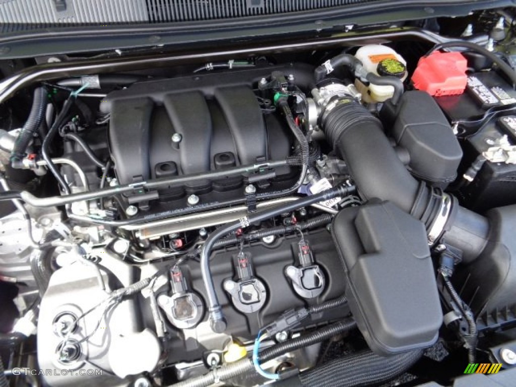 2015 Taurus SEL - Magnetic Metallic / Charcoal Black photo #12