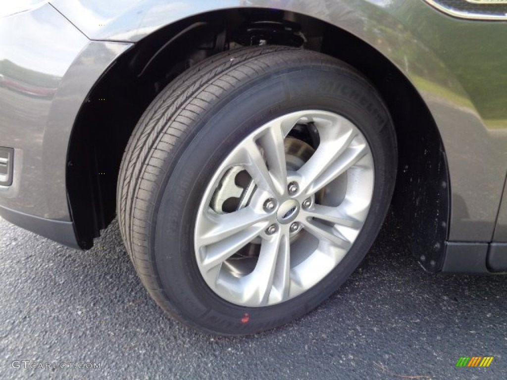 2015 Taurus SEL - Magnetic Metallic / Charcoal Black photo #13