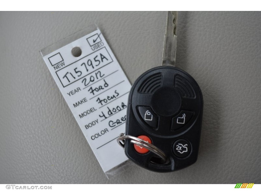 2012 Focus SEL Sedan - Frosted Glass Metallic / Stone photo #26