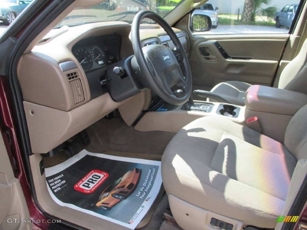 2002 Grand Cherokee Laredo 4x4 - Dark Garnet Red Pearlcoat / Sandstone photo #9