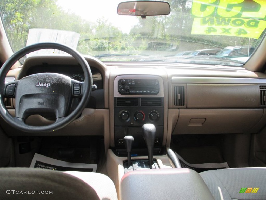 2002 Grand Cherokee Laredo 4x4 - Dark Garnet Red Pearlcoat / Sandstone photo #11