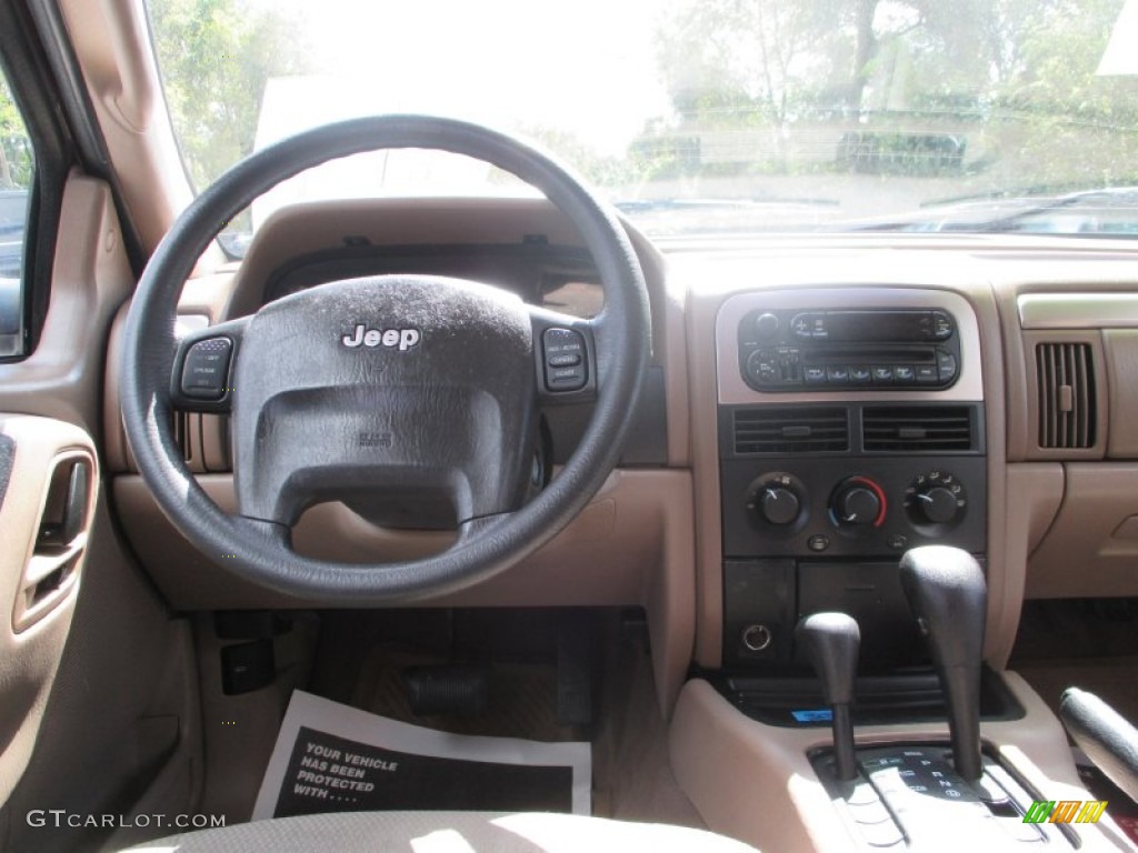 2002 Grand Cherokee Laredo 4x4 - Dark Garnet Red Pearlcoat / Sandstone photo #12