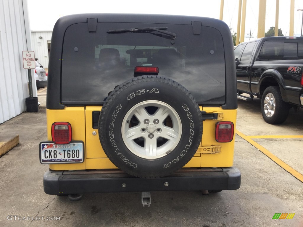 2004 Wrangler Unlimited 4x4 - Solar Yellow / Dark Slate Gray photo #3