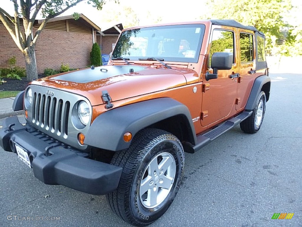 2010 Wrangler Unlimited Mountain Edition 4x4 - Mango Tango Pearl / Dark Slate Gray/Medium Slate Gray photo #1