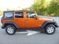Mango Tango Pearl 2010 Jeep Wrangler Unlimited Mountain Edition 4x4 Exterior