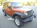 Mango Tango Pearl 2010 Jeep Wrangler Unlimited Mountain Edition 4x4 Exterior