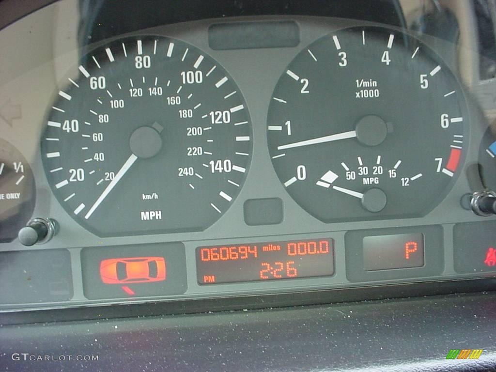 2004 3 Series 325i Sedan - Jet Black / Sand photo #17
