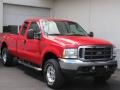 2003 Red Clearcoat Ford F250 Super Duty Lariat SuperCab 4x4  photo #1