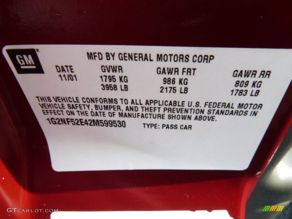 2002 Grand Am SE Sedan - Redfire Metallic / Dark Pewter photo #14