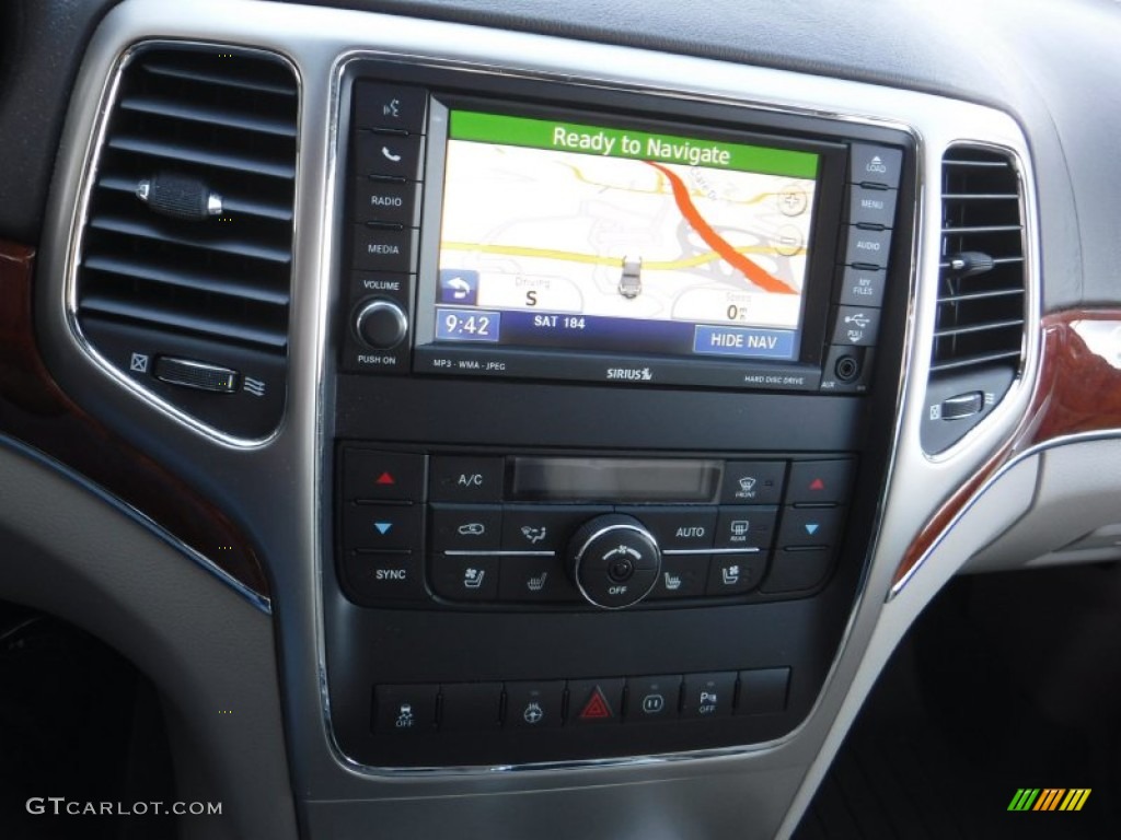 2011 Grand Cherokee Overland 4x4 - Inferno Red Crystal Pearl / Dark Frost Beige/Light Frost Beige photo #16